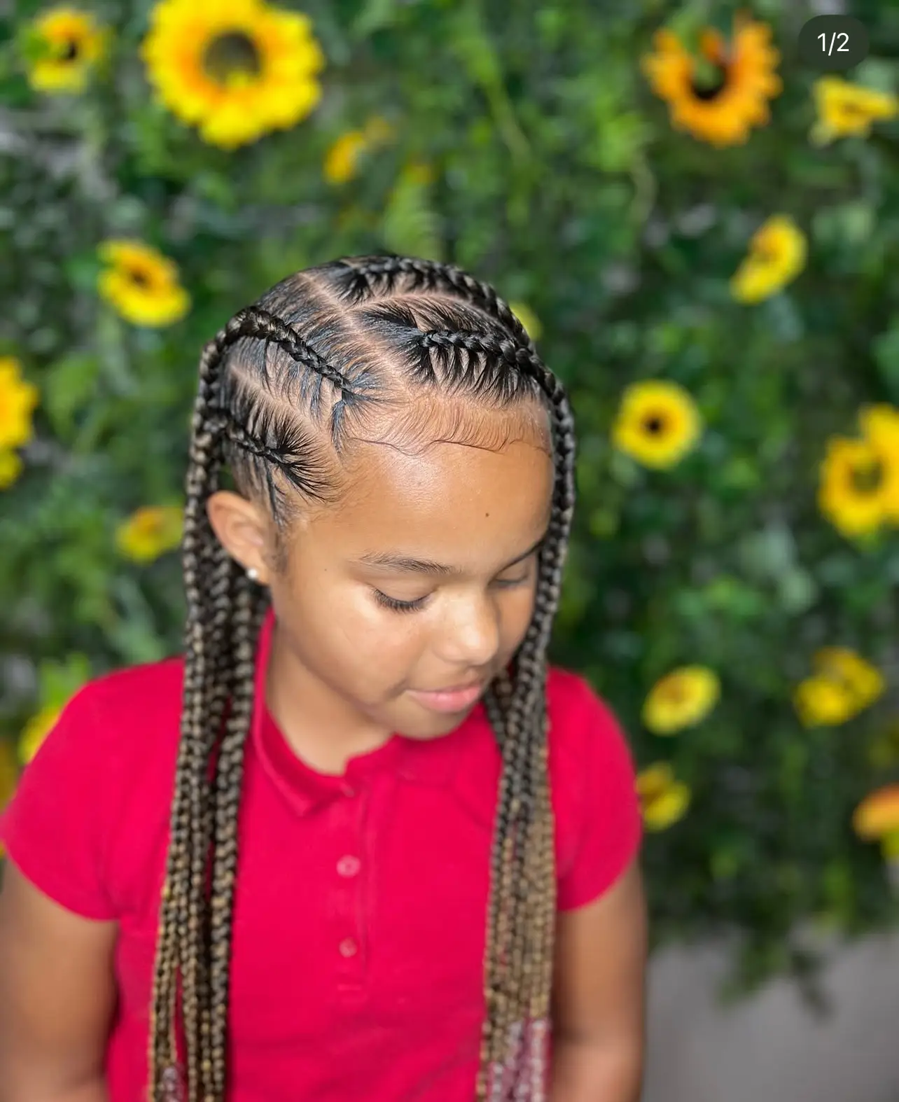 Kids cornrows with added hair 